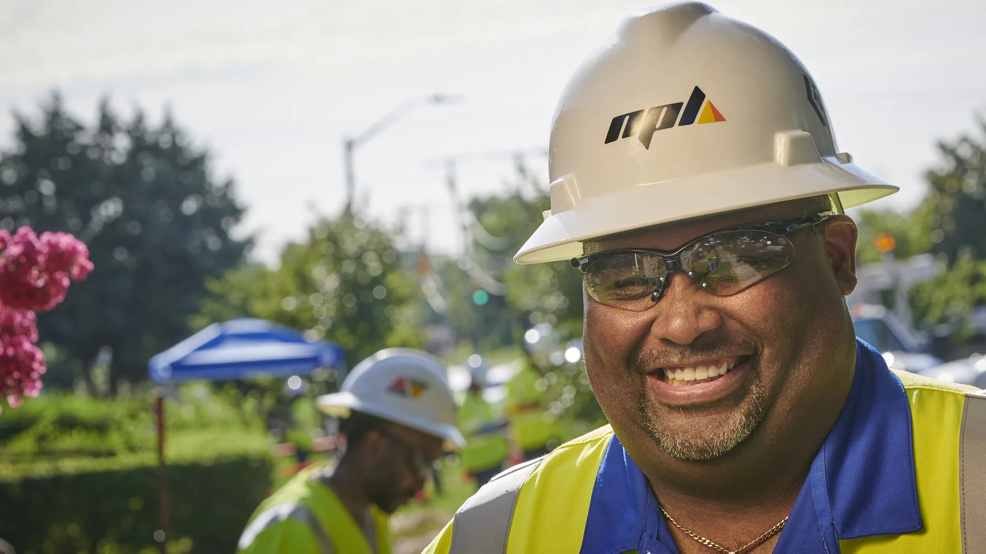 Construction crew member smiling